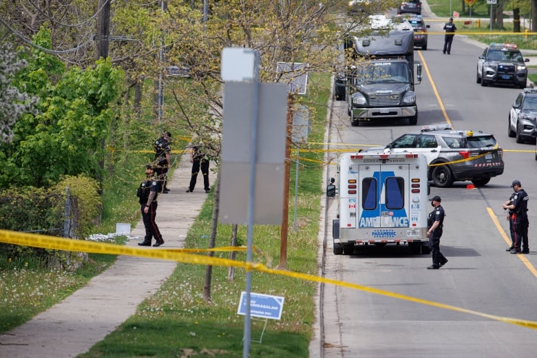 Suspect shot dead by Toronto police after schools locked down over reports of man with rifle